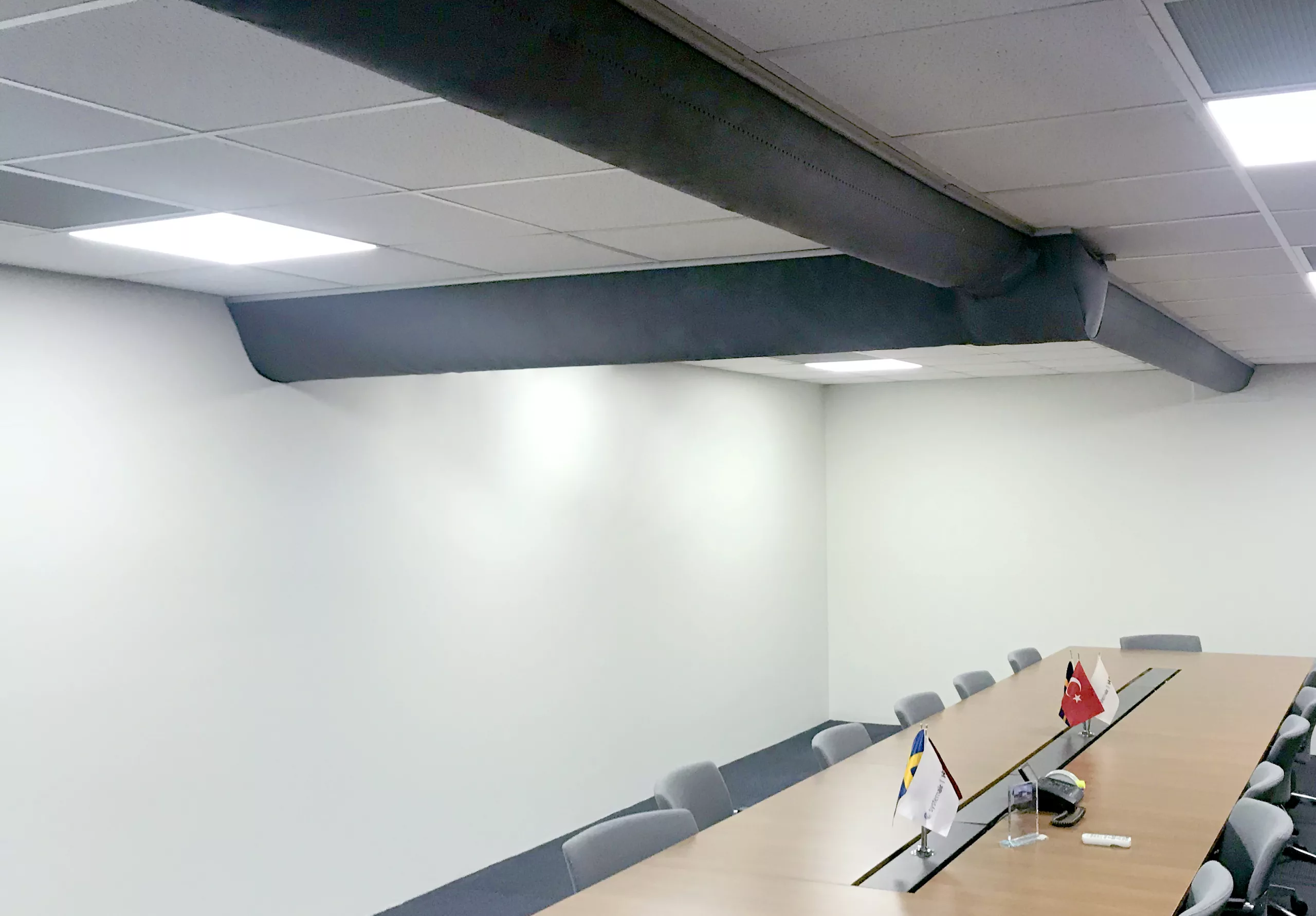 Black, D-Shape zip-a-duct fabric duct installed in Systemair HSK office