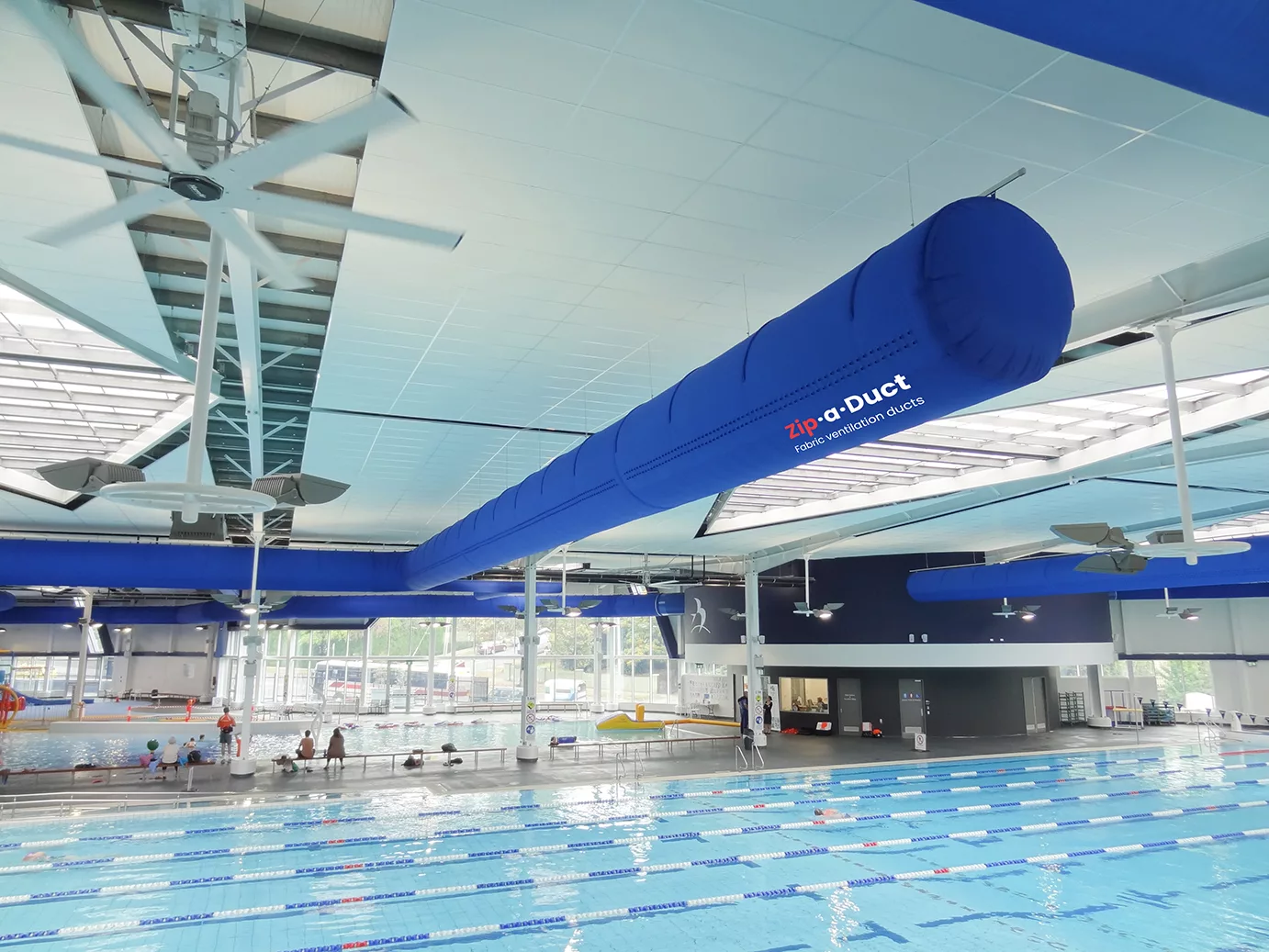 Zip-a-duct blue fabric duct systems installed in Greensborough swimming pool facility, AU