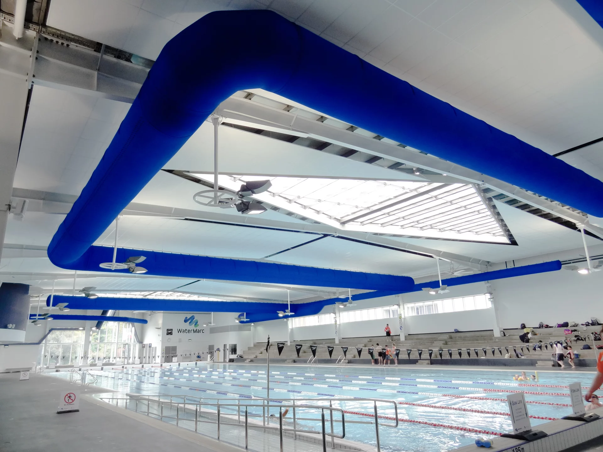 Blue fabric duct in Greensborough indoor swimming pool, AU
