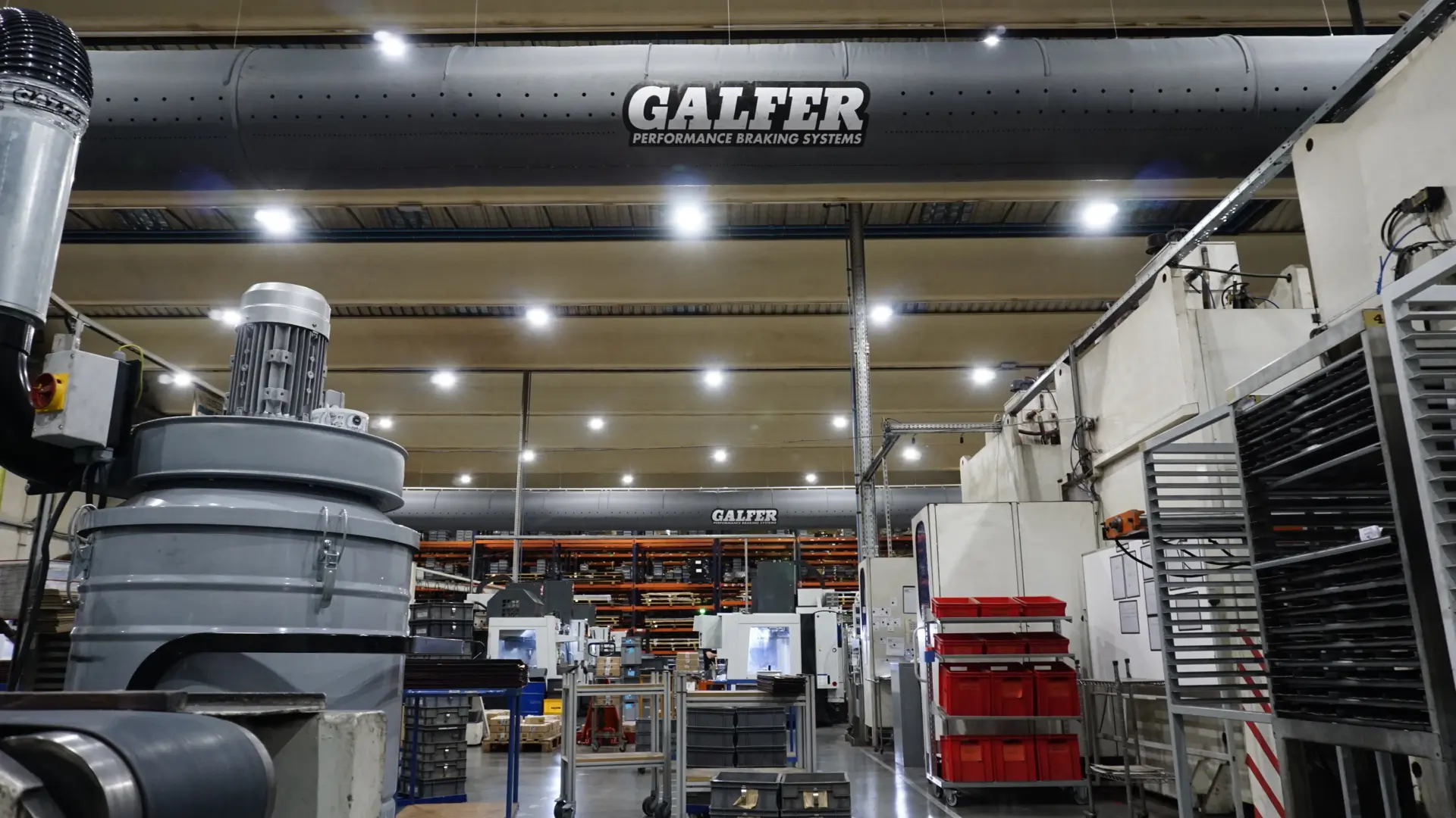 Grey zip-a-duct air duct system inside Galfer production factory, ES