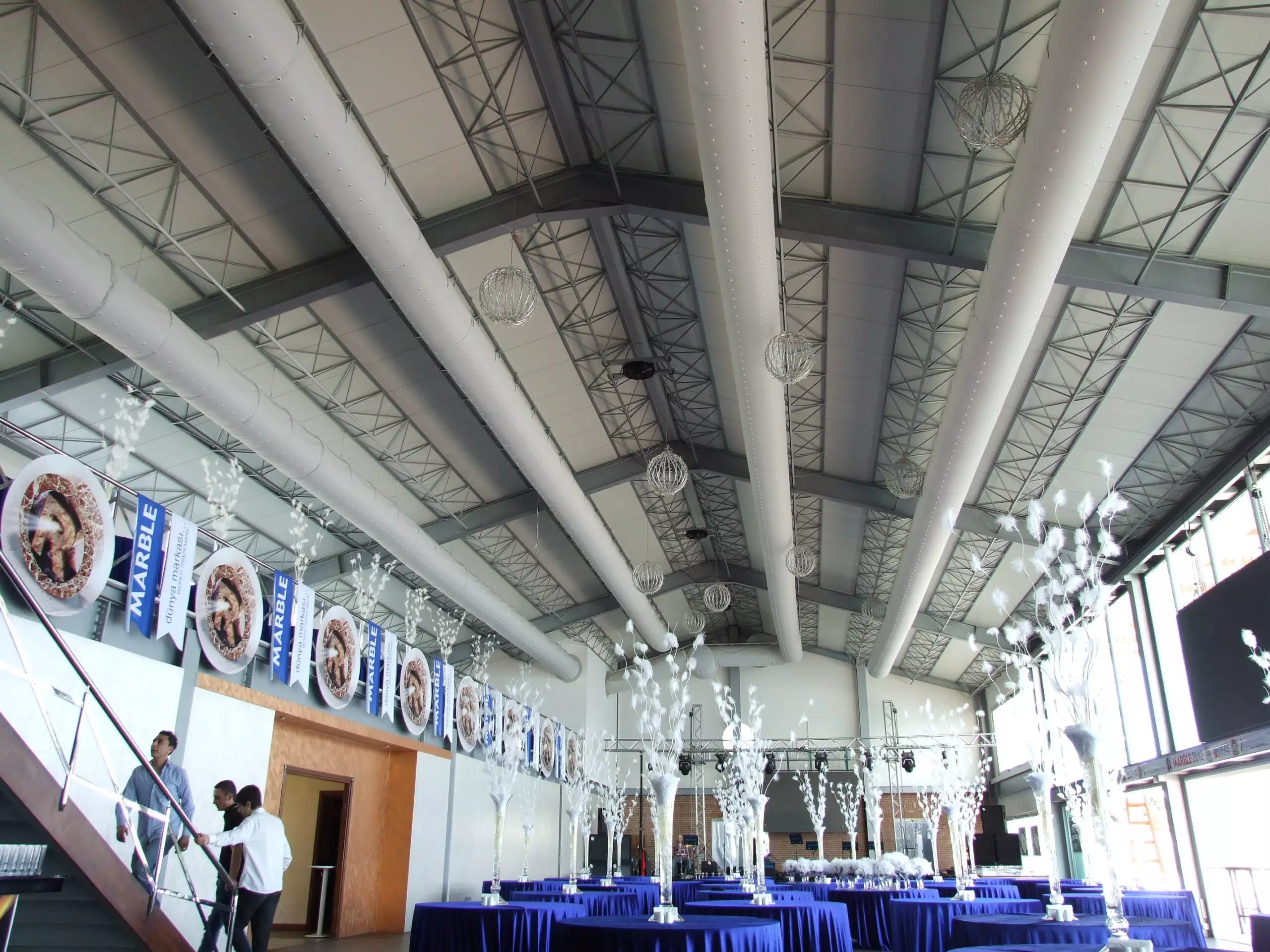 White zip-a-duct hvac fabric ducts inside a dining venue