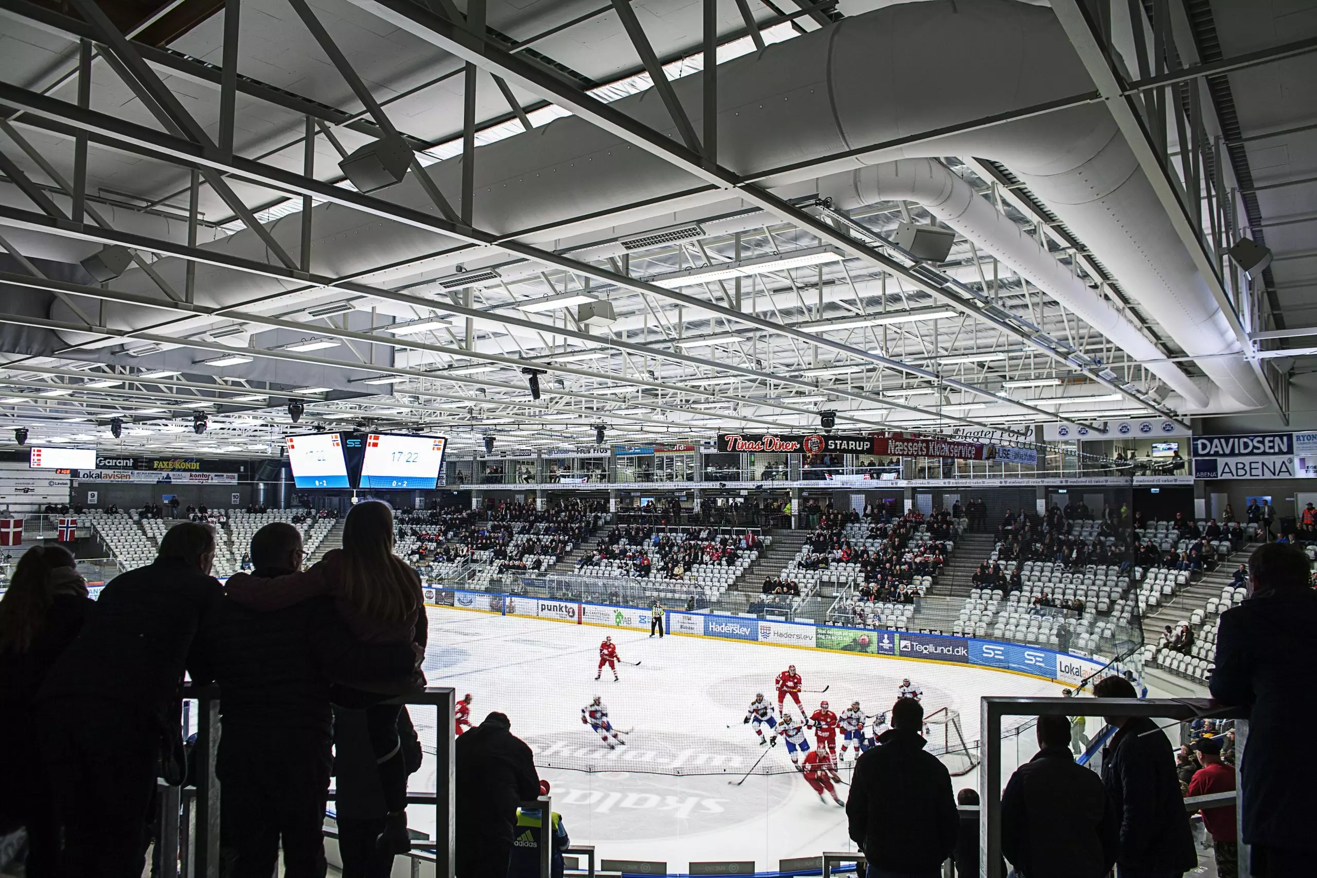 White zipaduct fabric duct inside a hockey ice rink
